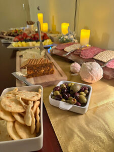 A decorated dining table with lot of food